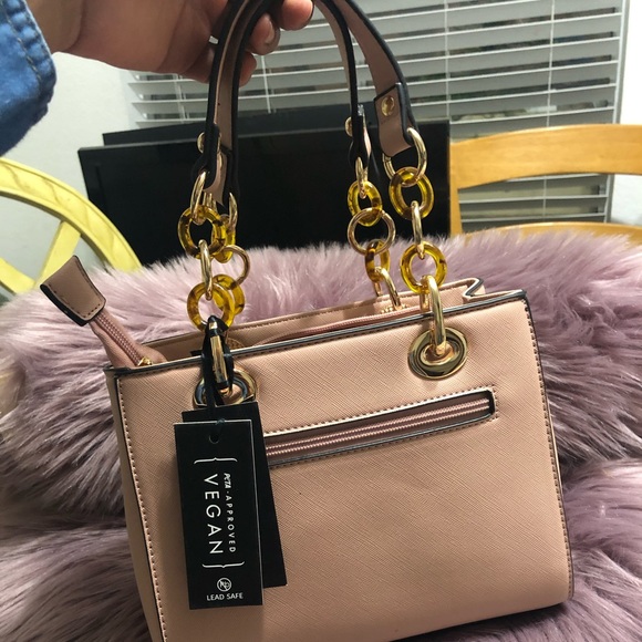 la terre fashion Handbags - Light pink mini purse 👜